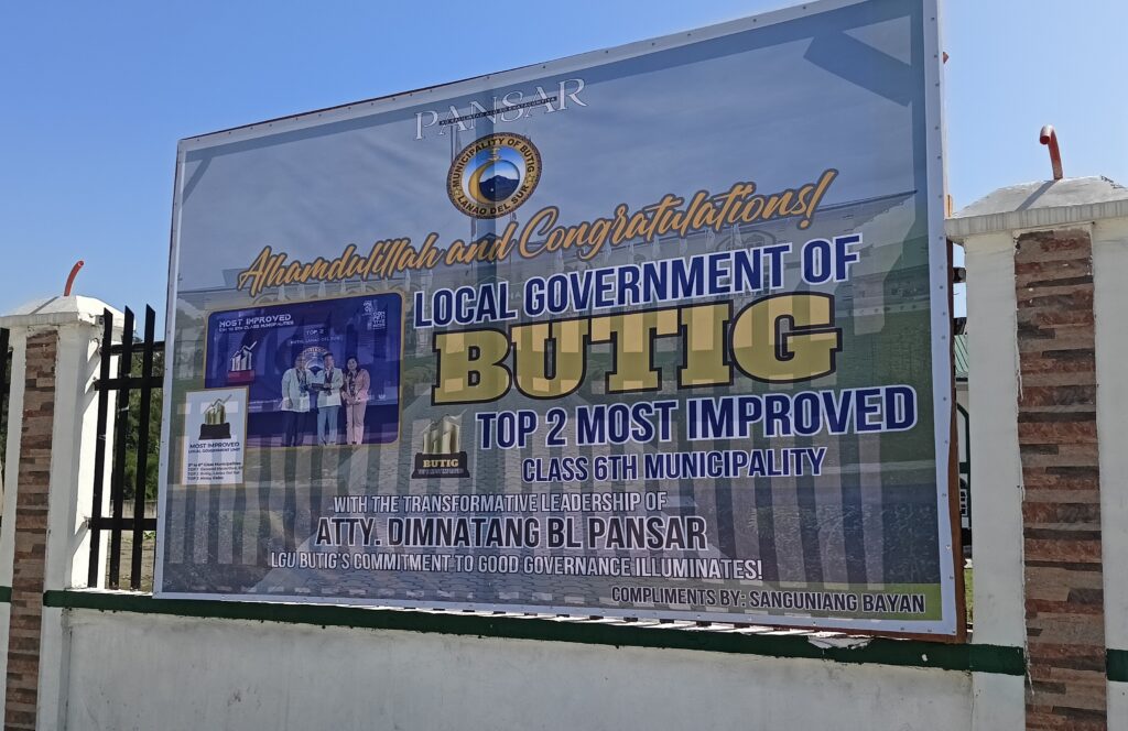 Banner proudly displaying Butig's DTI Award: Top 2 Most Improved 6th Class Municipality in 2023.